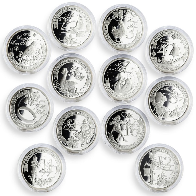 Набор из 12-ти серебряных монет Ниуэ "Двенадцать дней Рождества" 2009 г.в., 12*25 г чистого серебра (Проба 0,999)